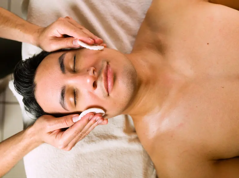 Man content with face massage