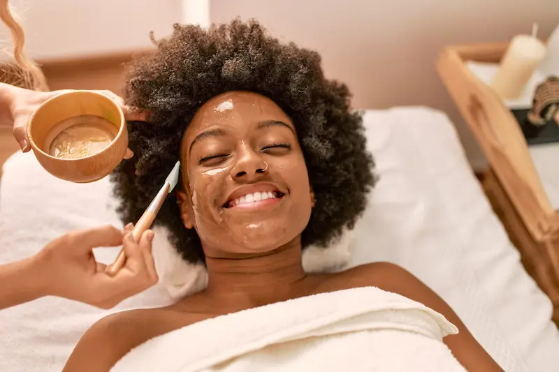 Woman enjoying a facial treatment