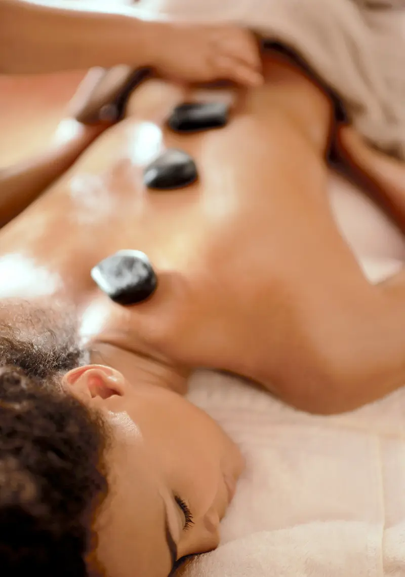 Hot Stones on a woman's back
