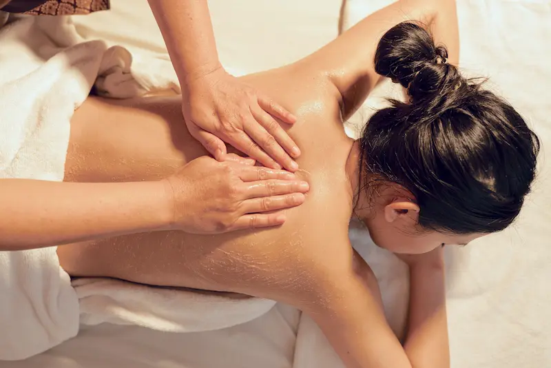 Woman enjoying back massage
