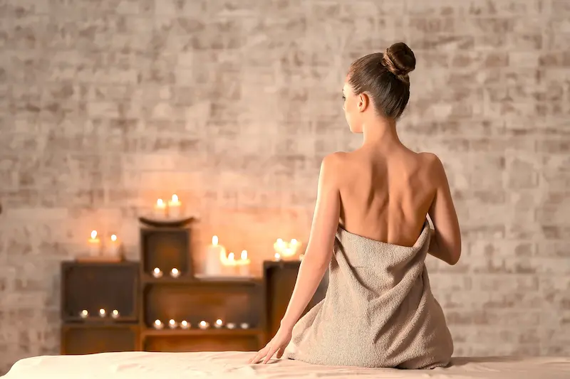 A woman sitting on a table